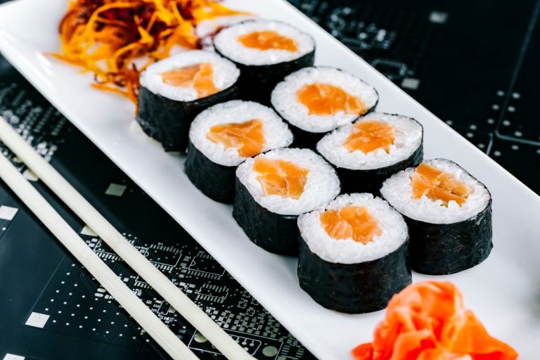 nori-sushi-rolls-with-salmon-served-with-ginger-wasabi-shredded-carrot (1)